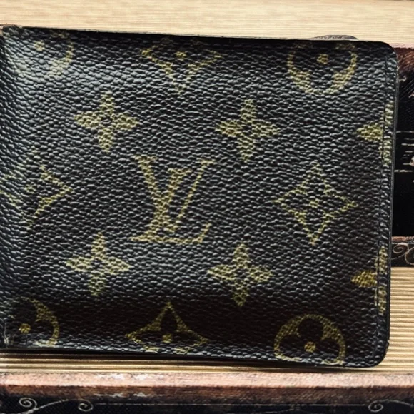 Louis Vuitton men’s multiple monogram wallet.